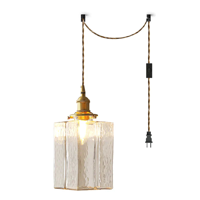 Glass Pendant Light with Brass Swag Design | Sorina