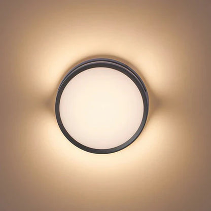 Round Outdoor LED Wall Light Modern Metal Design | Quorix