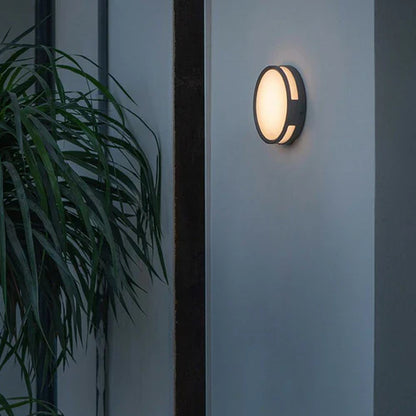 Round Outdoor LED Wall Light Modern Metal Design | Quorix