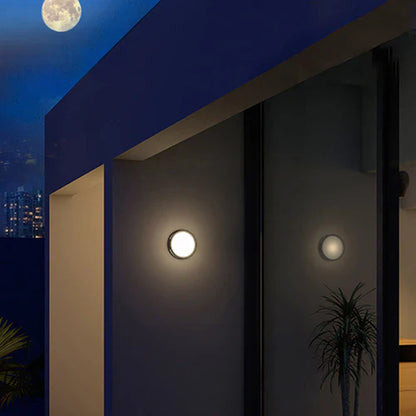 Round Outdoor LED Wall Light Modern Metal Design | Quorix