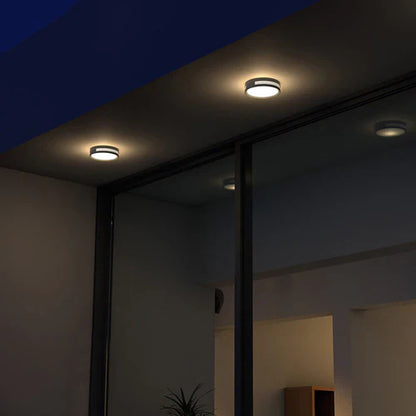 Round Outdoor LED Wall Light Modern Metal Design | Quorix